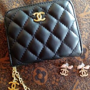 CHANEL Black Quilted Wallet with Gold Logo